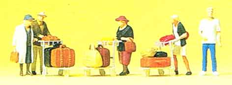 Passengers with luggage trolleys